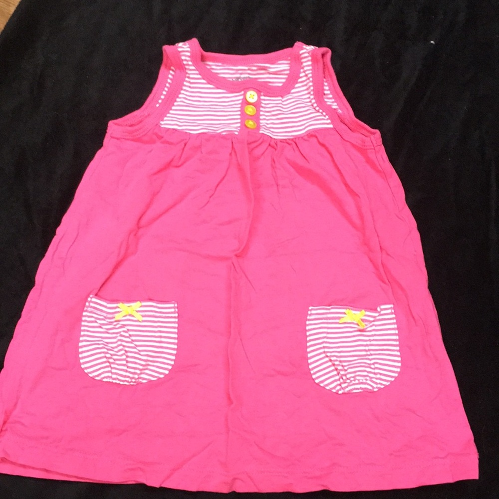 A baby girls summer dress pretty in pink